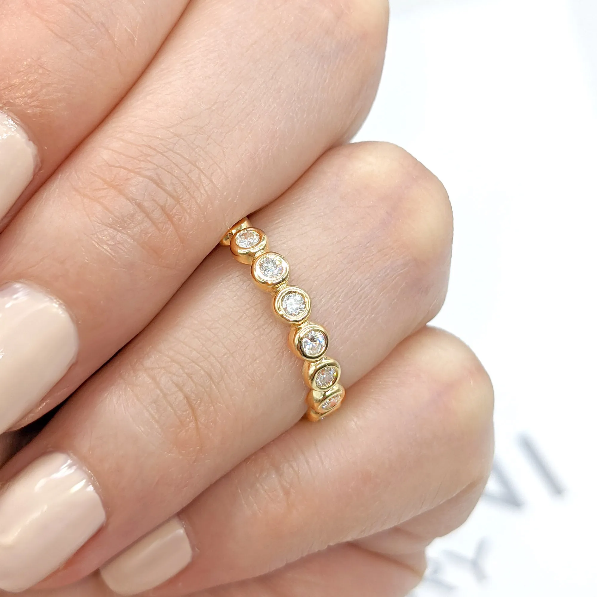 0.70 ct Round Diamond Eternity Band Bezel Set Ring