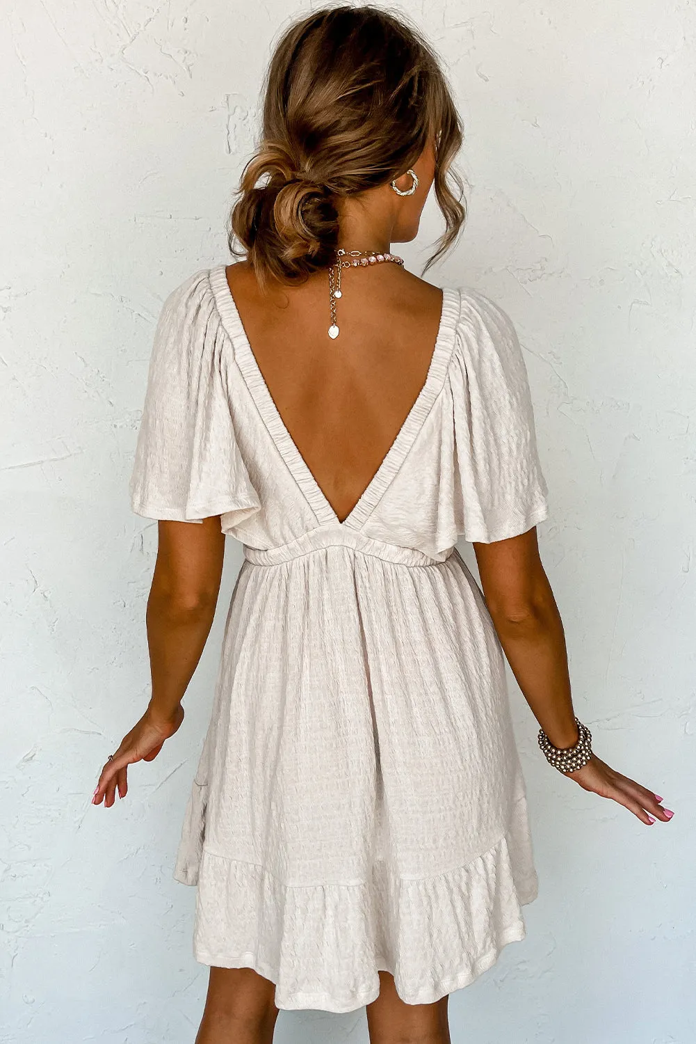 Beige Textured Deep V Neck Cutout Back Mini Dress