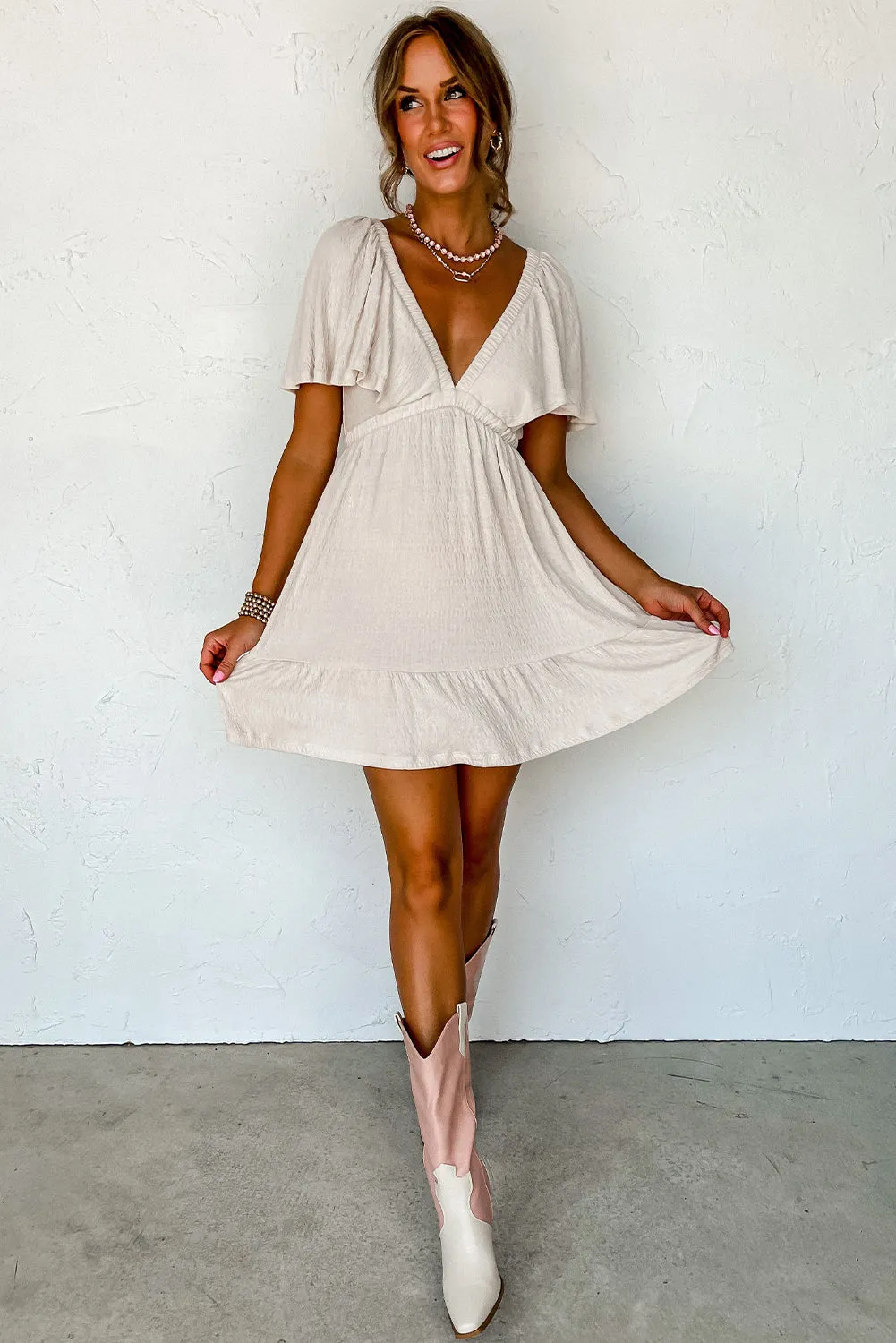 Beige Textured Deep V Neck Cutout Back Mini Dress