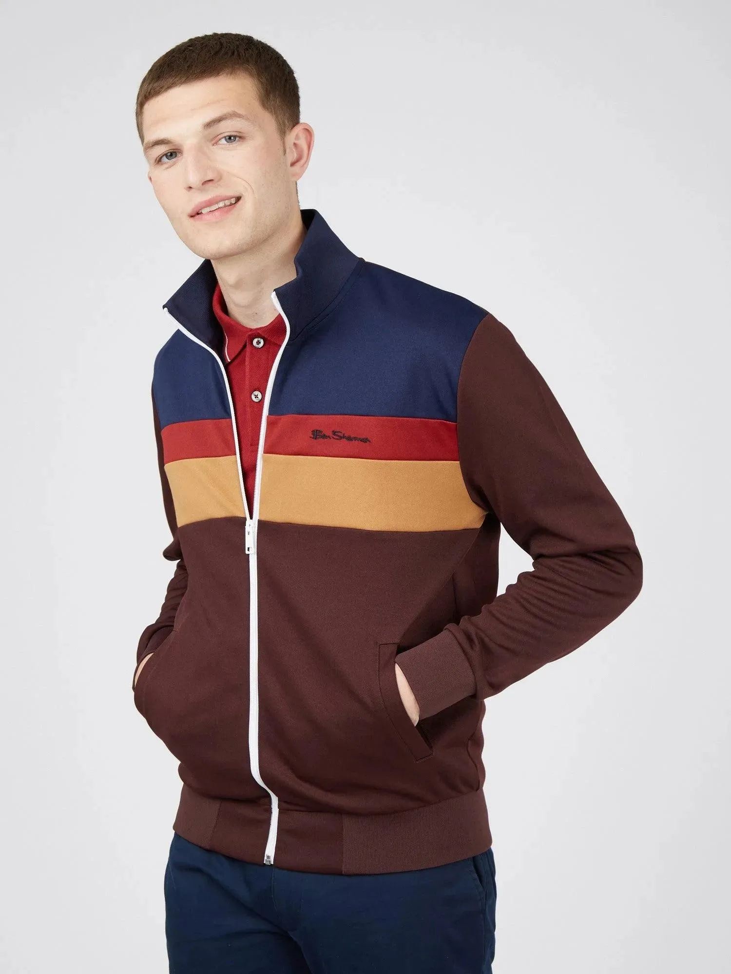 Chandal de tricot con cremallera y color block burdeos