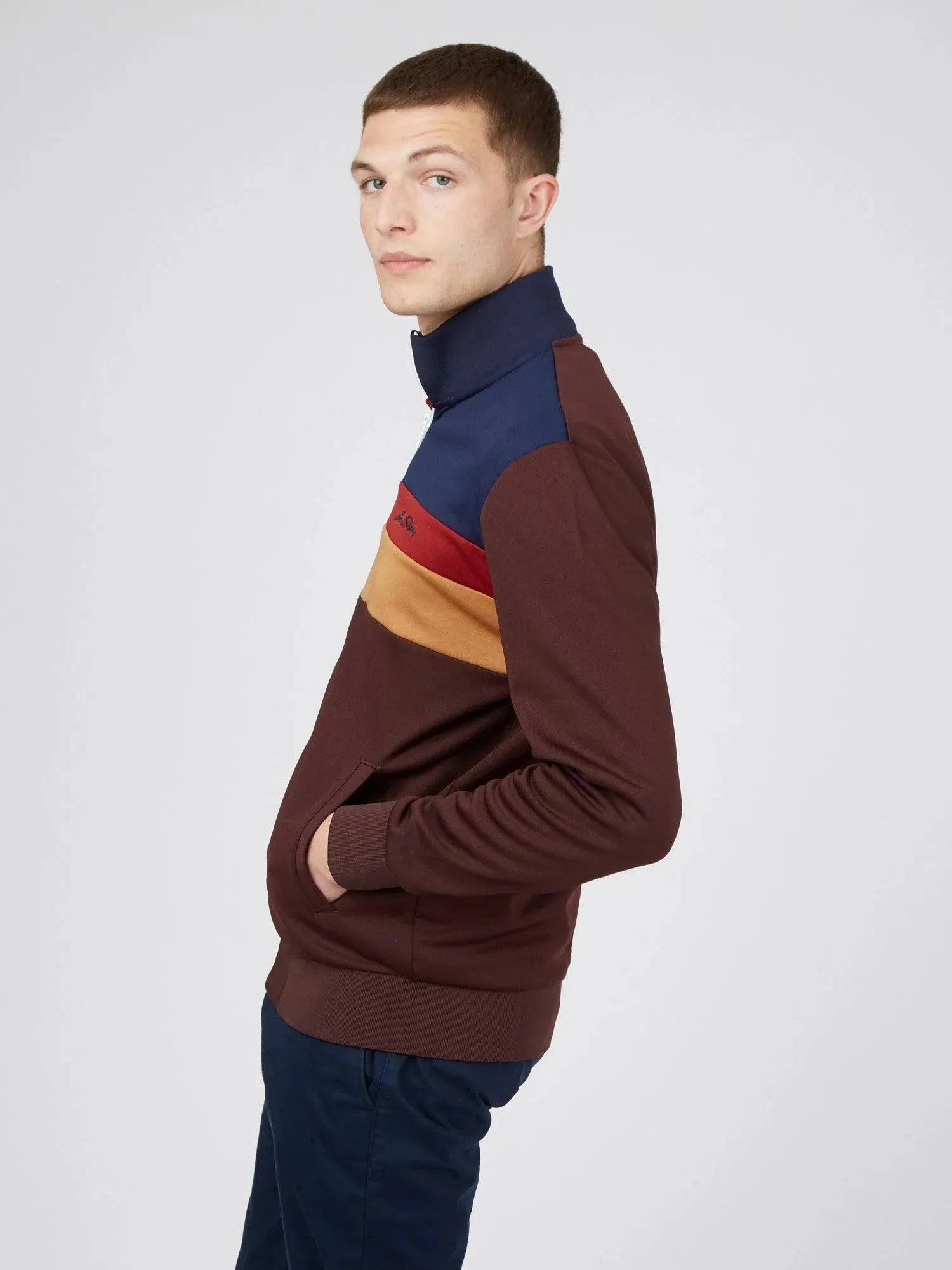 Chandal de tricot con cremallera y color block burdeos