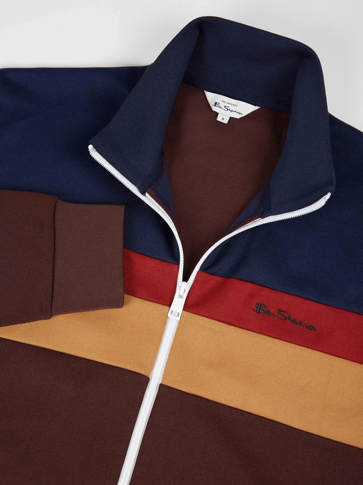 Chandal de tricot con cremallera y color block burdeos