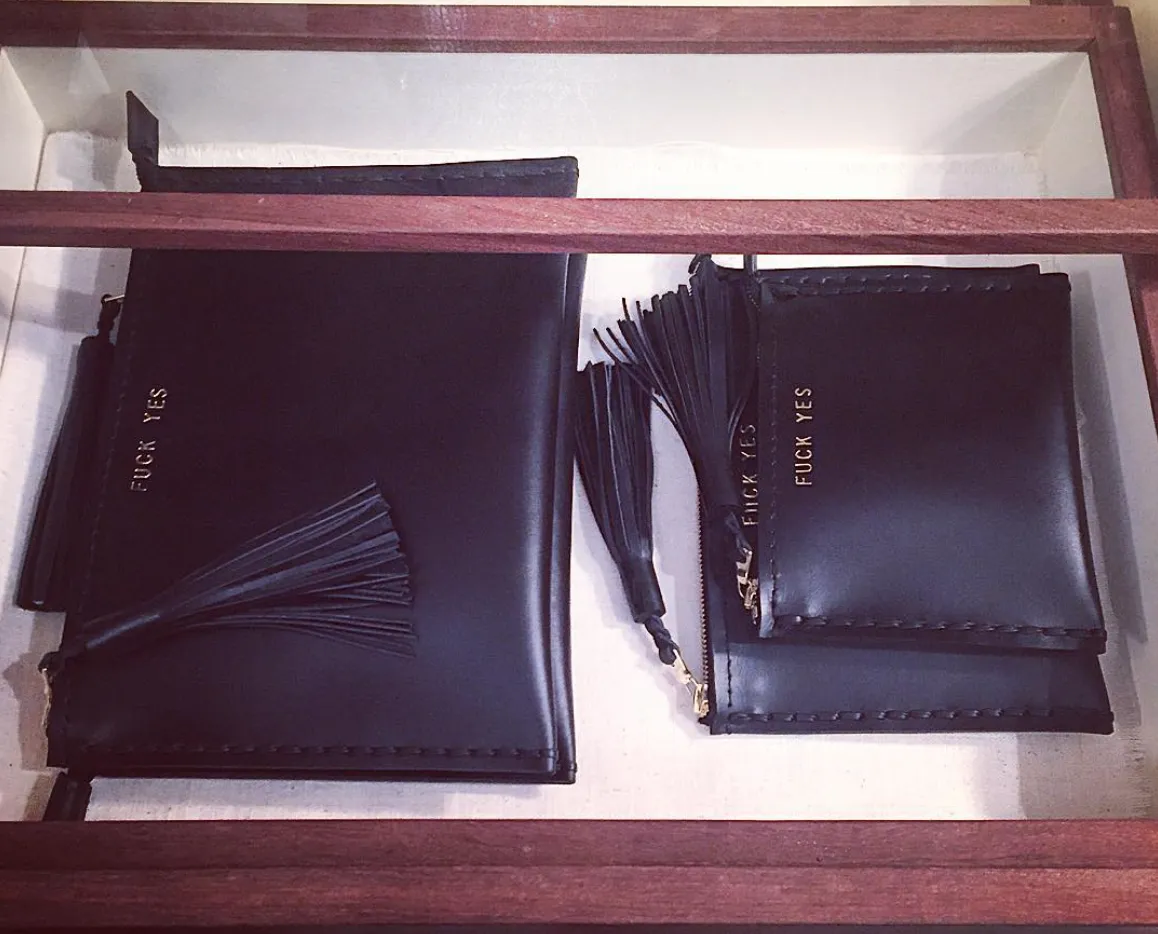 Embossed 'FUCK YES' Laced Leather Clutch