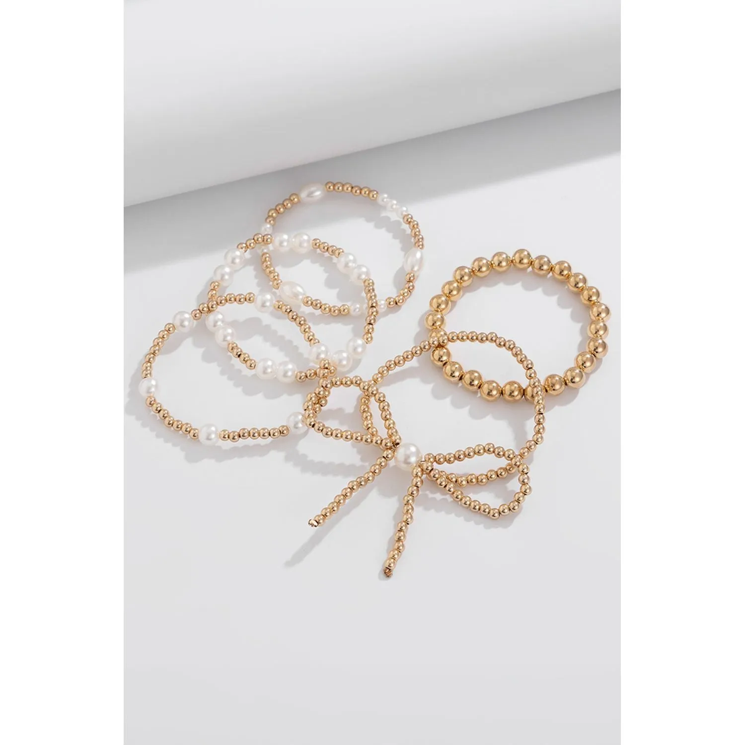 Gold Bow Knot Pearl Beaded Multi Layered Bracelet Set